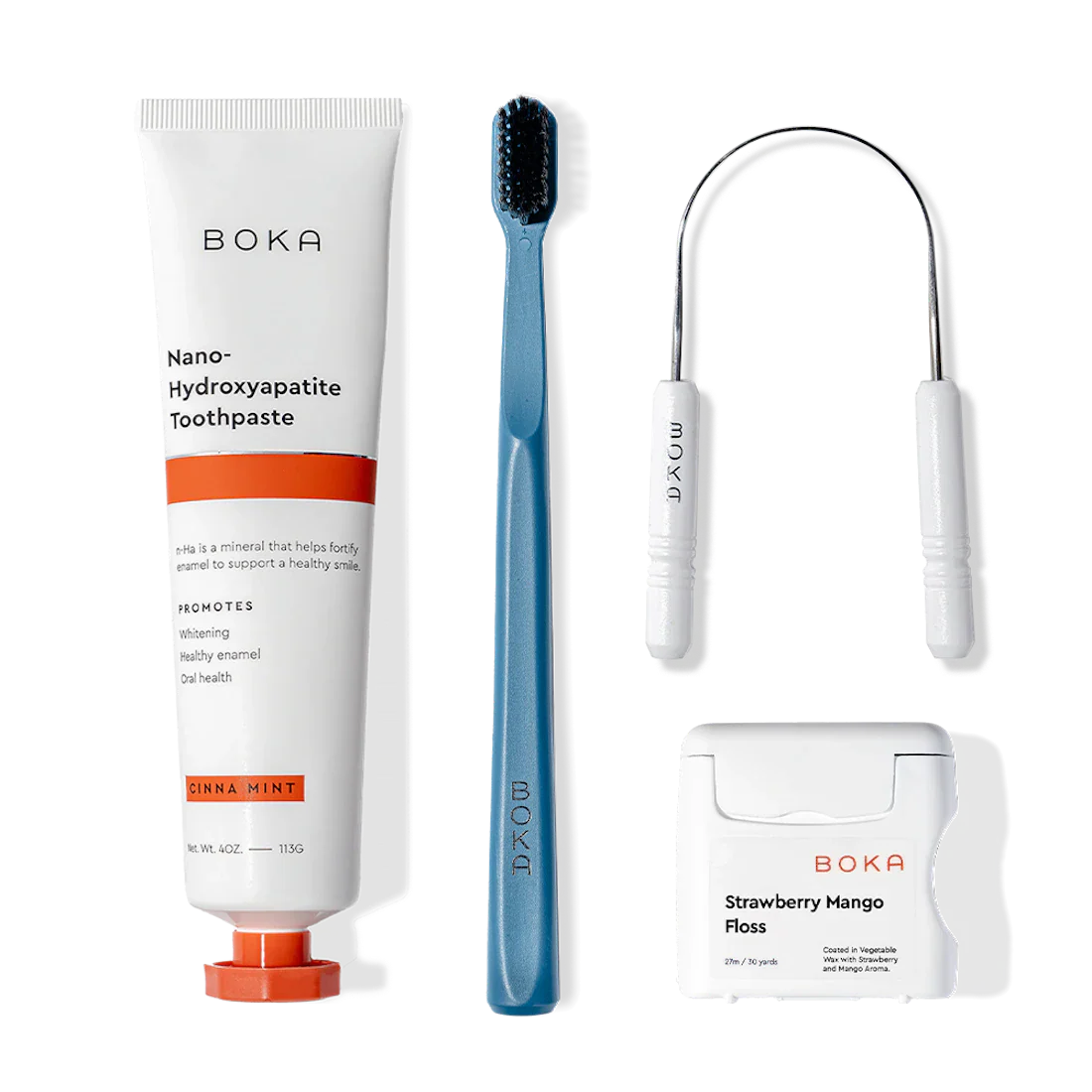 Boka Starter Kit with nano-hydroxyapatite toothpaste, charcoal toothbrush, floss, and tongue scraper.