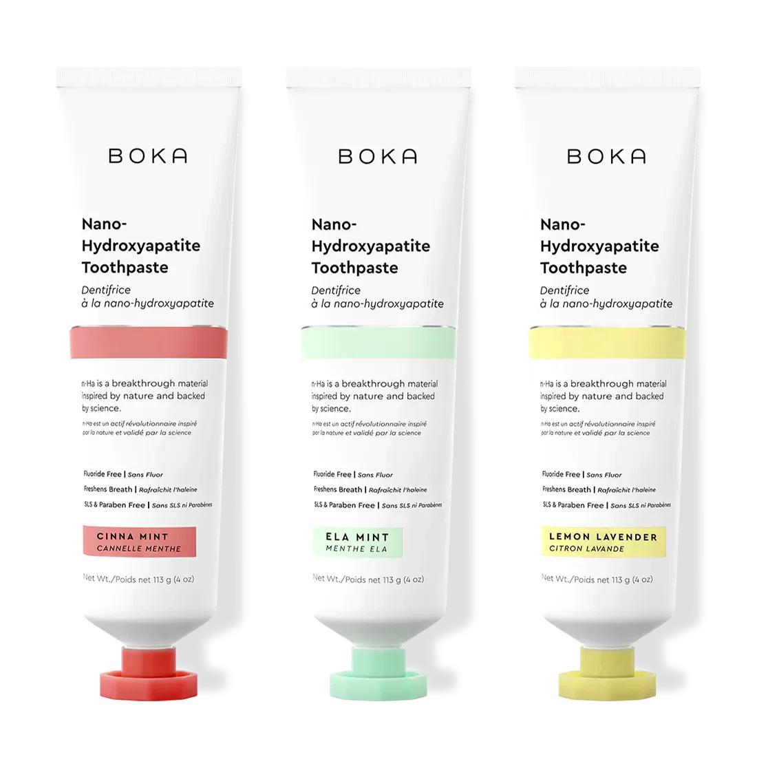 Three bottles of Boka Nano-Hydroxyapatite Toothpaste with different colored caps on a white background.