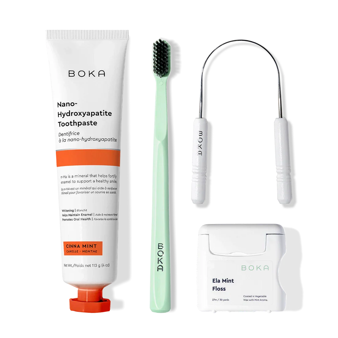 Boka Starter Kit with toothpaste, tongue cleaner, toothbrush, and floss on a white background.