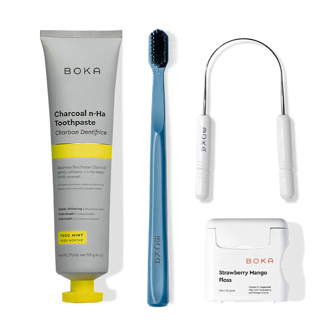 Starter Kit: nano-hydroxyapatite toothpaste, blue toothbrush, tongue scraper, and mango floss.