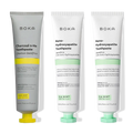 Three Charcoal Yuzu Mint Whitening n-Ha Toothpaste 3-packs, displayed upright on a white surface.