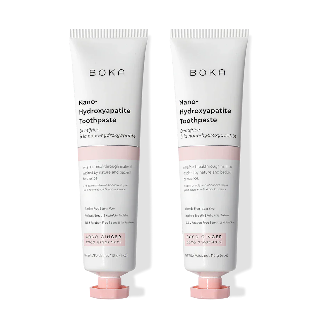 Two tubes of Boka Nano-Hydroxyapatite Toothpaste with pink caps on a white background
