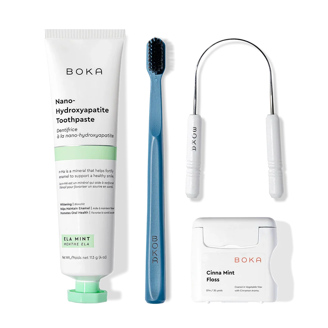 Boka Starter Kit: tongue cleaner, nHa toothpaste, blue charcoal brush, and Cinna Mint floss.