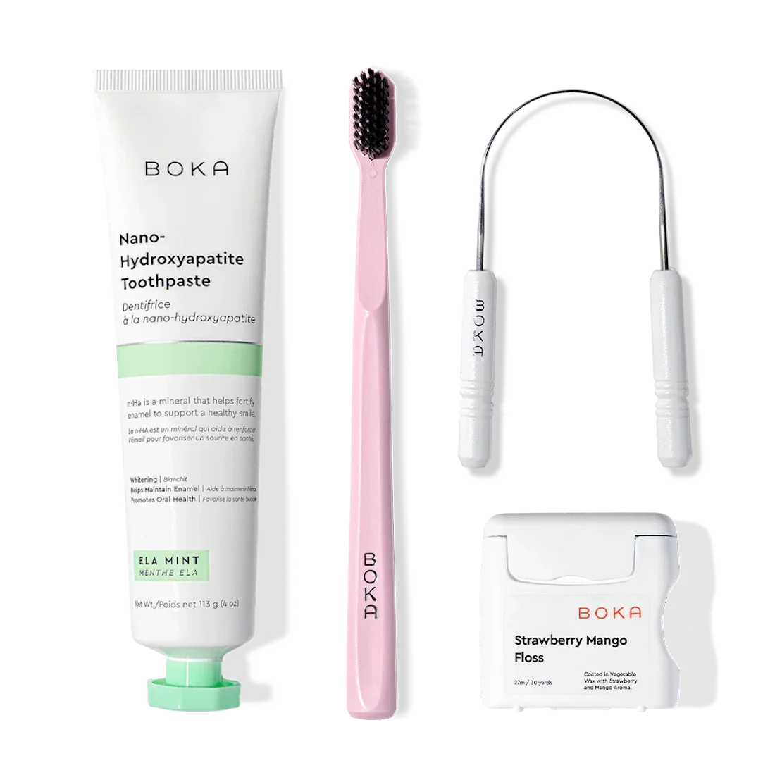 Starter Kit: pink toothbrush, floss, floss pick, and nano-hydroxyapatite toothpaste on white.