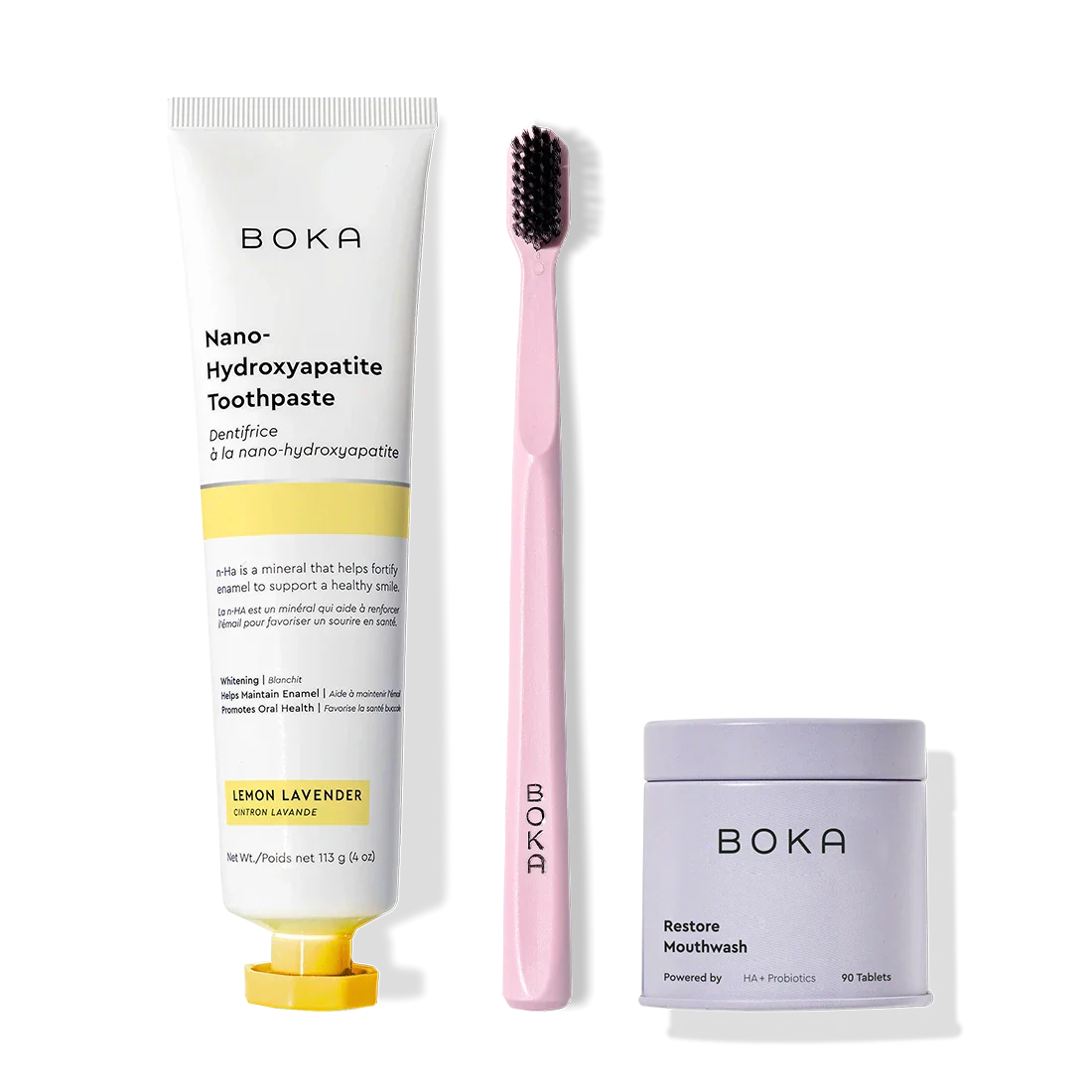 Fresh Faced toothpaste, pink charcoal-bristle toothbrush, and Fresh Faced mouthwash tablets displayed.