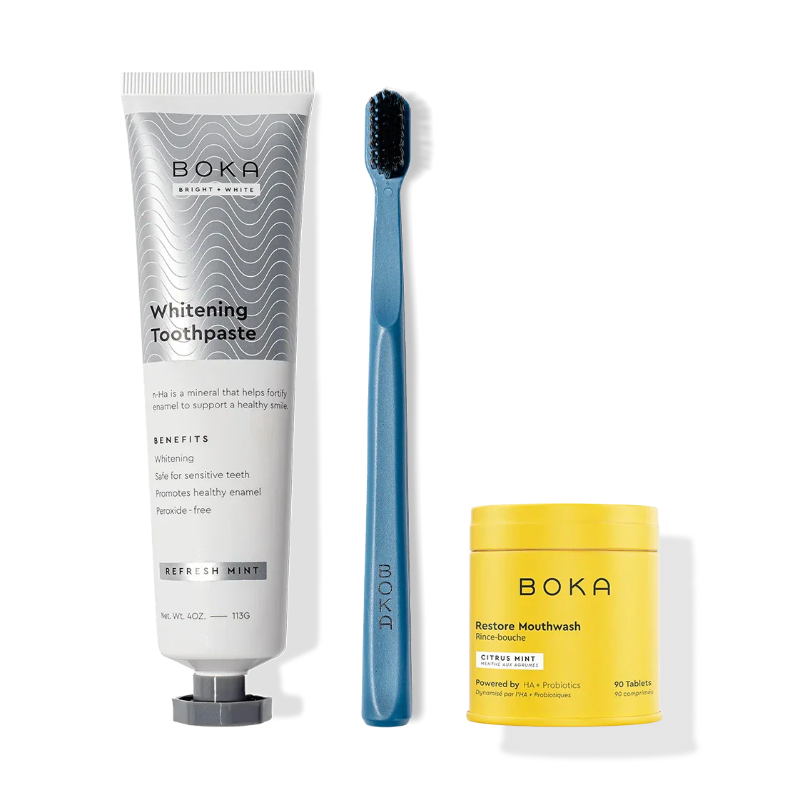 Fresh Faced toothpaste, a blue charcoal-bristle brush, and restore mouthwash tablets upright.