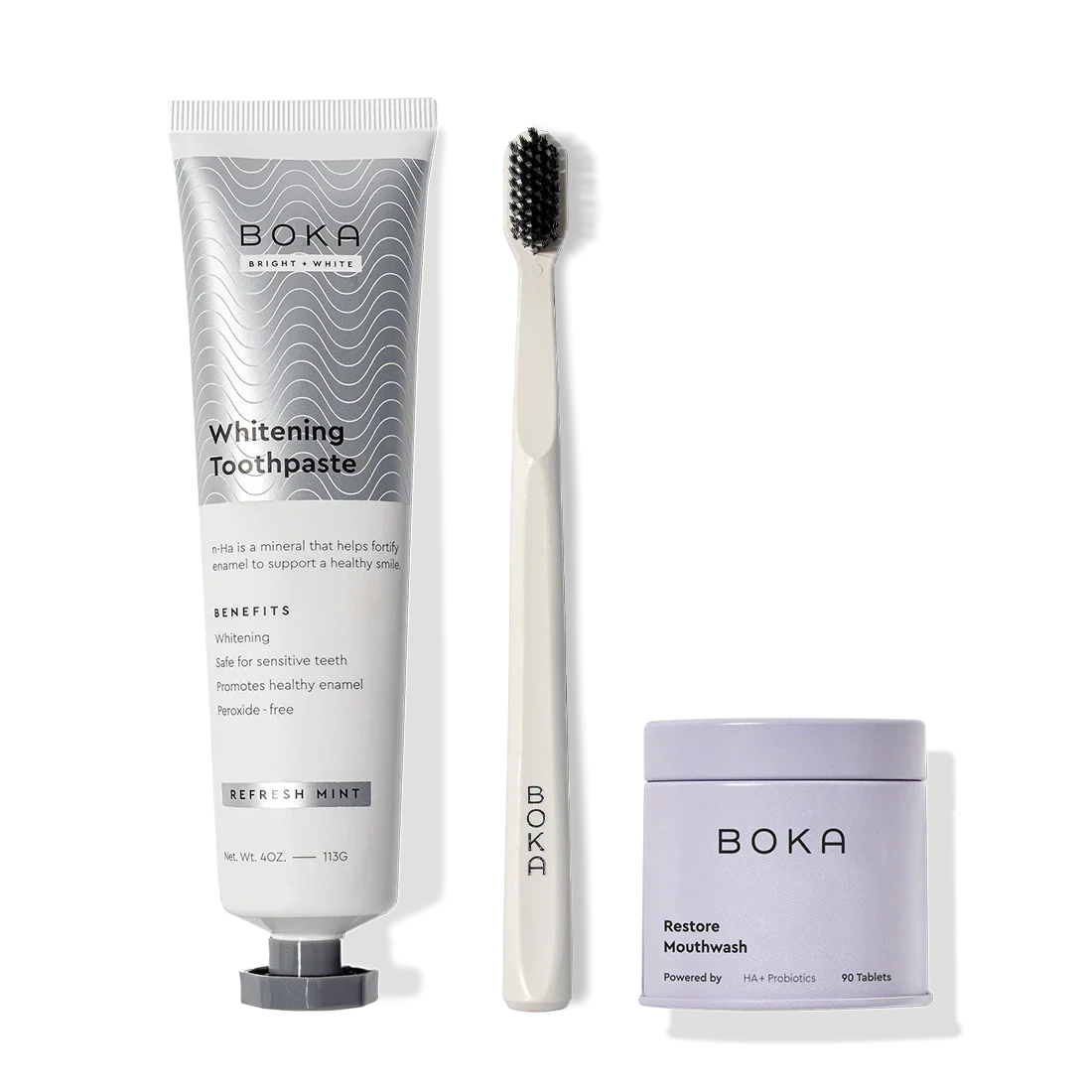 Fresh Faced toothpaste, toothbrush with activated charcoal bristles, and restore tablets on display.