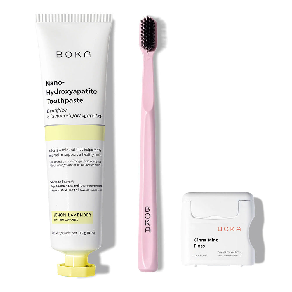 The Classic Kit includes nano-hydroxyapatite toothpaste, a pink charcoal brush, and teflon-free floss.