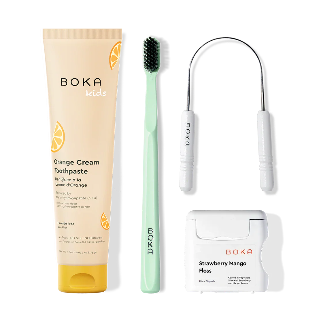 Boka dental care products including toothpaste, toothbrush, Tongue Scraper and floss on a white background