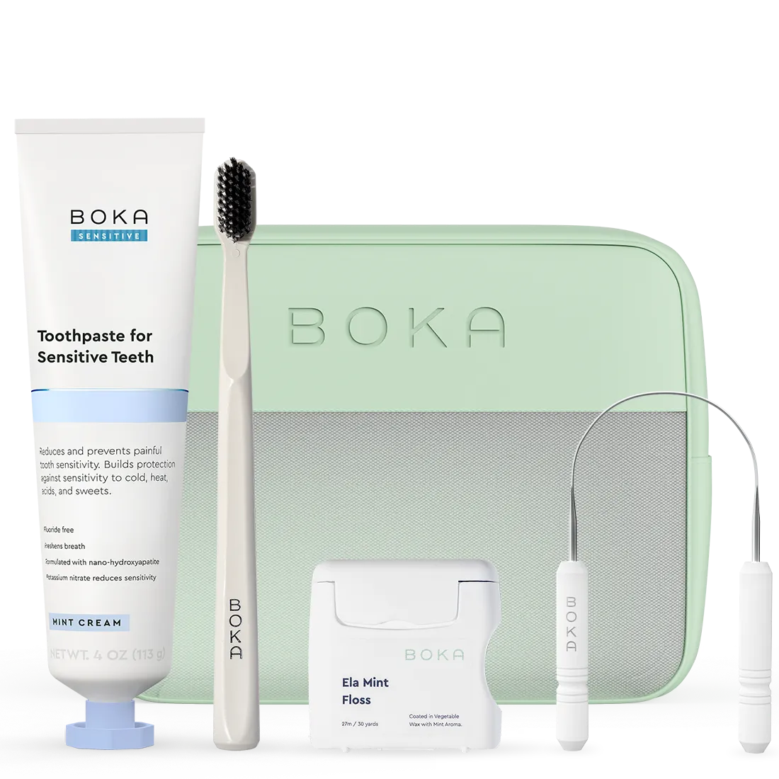 Boka dental care product set including toothpaste, toothbrush, floss, and pouch on a white background