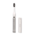 Boka Pocket Electric Toothbrush in silver with Sonic Pulse, white brush head, and travel cap.