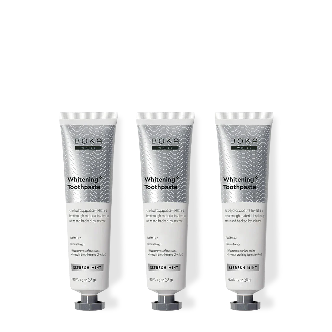 Three tubes of Boka Toothpaste on a white background